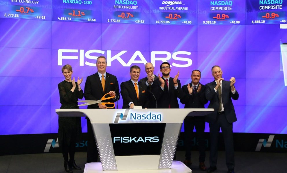 Kari Kauniskangas, President and CEO, Fiskars Corporation, third from left, is joined by fellow executives as he rings the closing bell on the last trading day of the year at the NASDAQ Marketsite in New York's Times Square on Friday, Dec. 30, 2016.